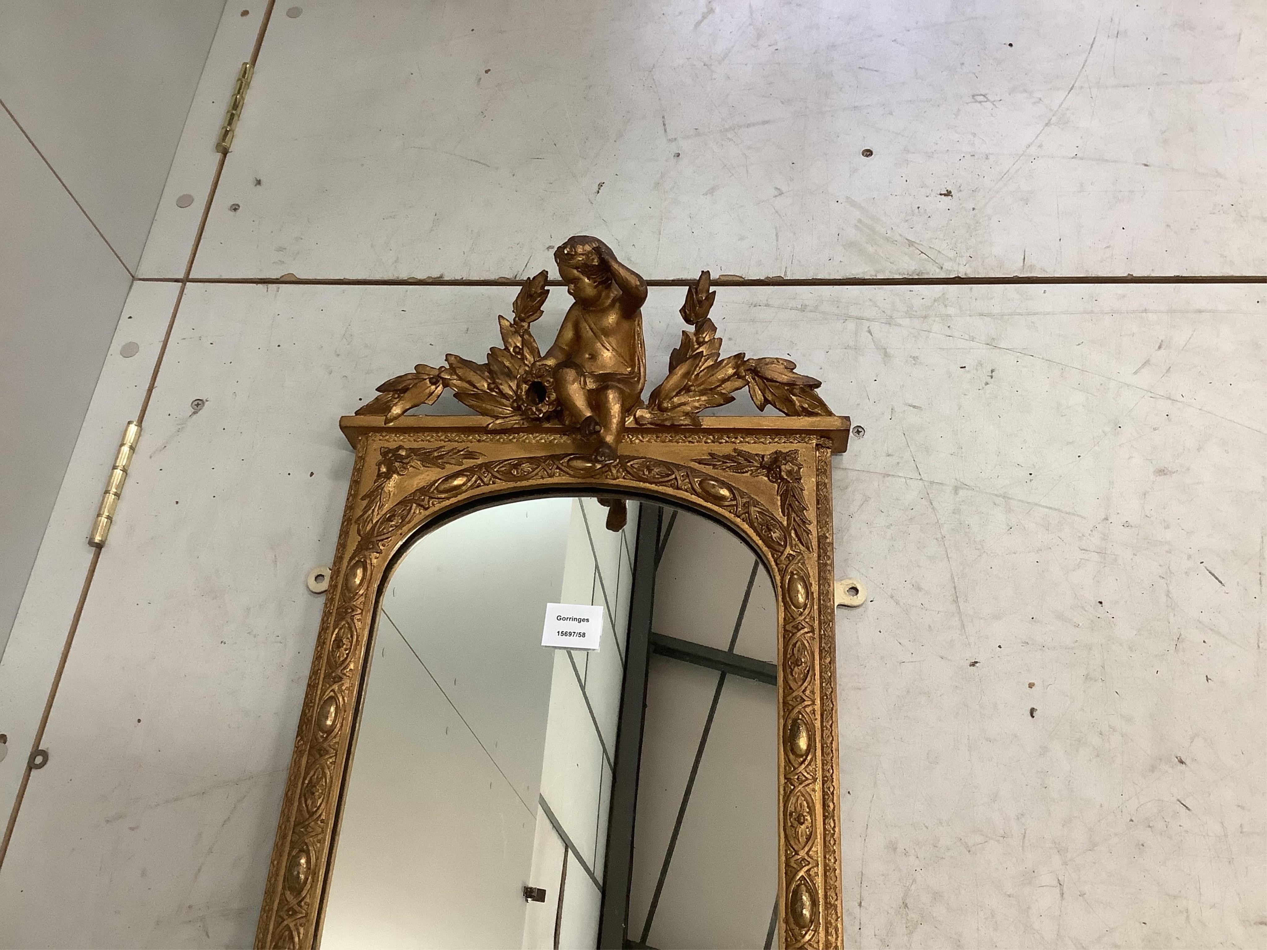 A Victorian giltwood and composition pier glass, width 46cm, height 110cm. Condition - fair